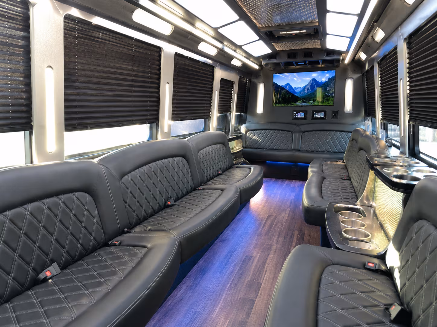 Wedding guests seated inside a party bus serving Reno